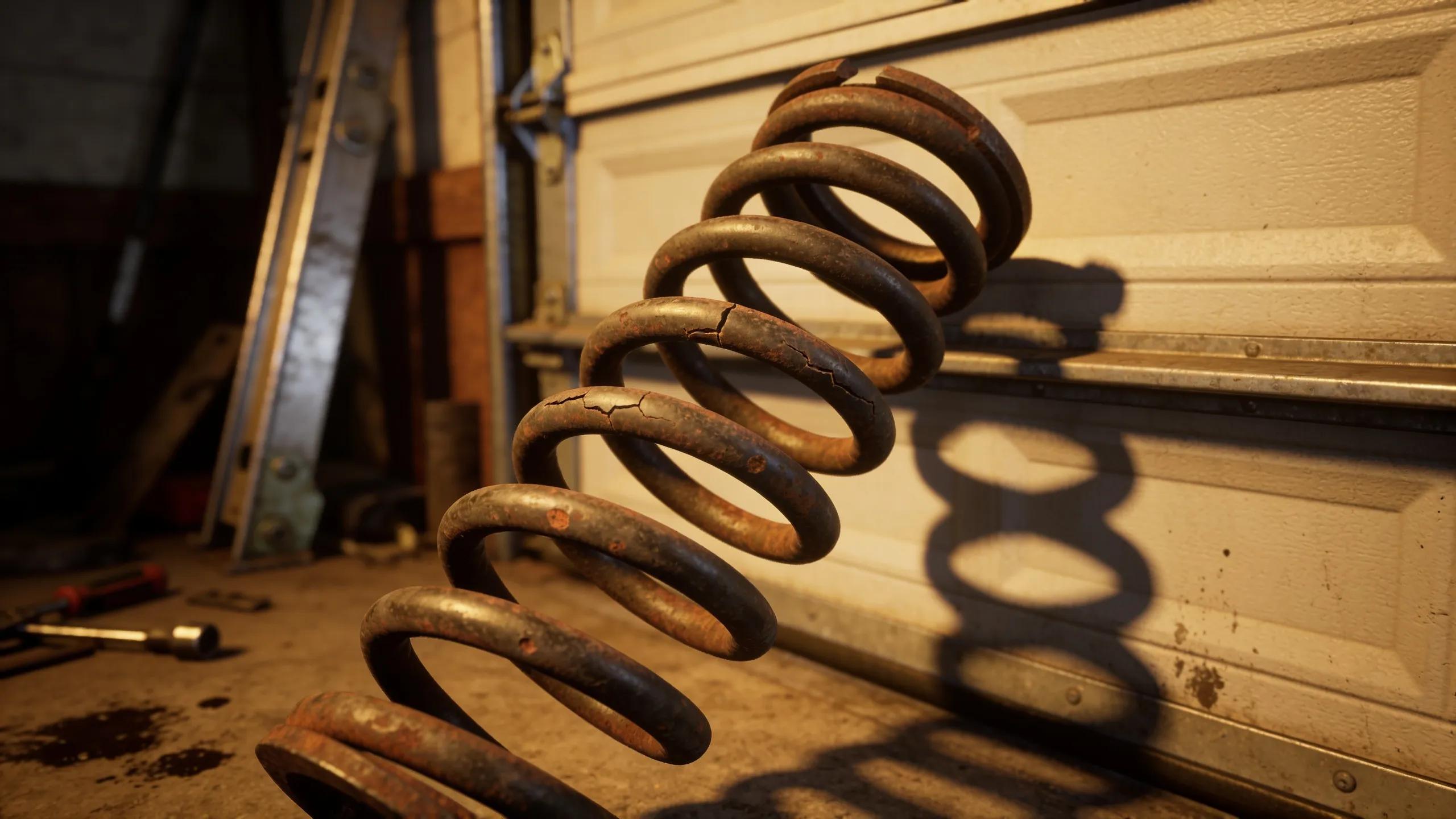 Close-up of worn garage door springs, indicating signs of wear affecting performance